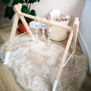 Wooden play gym with grey charm